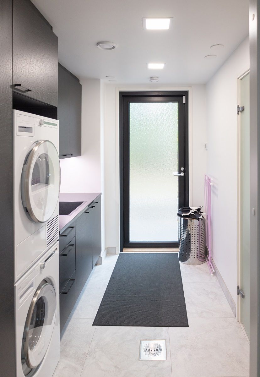 Led panel lights on the ceiling of a utility room.